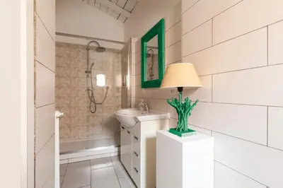 a bathroom with a sink and a shower at Pantheon Splendid Flat with Terrace in Rome
