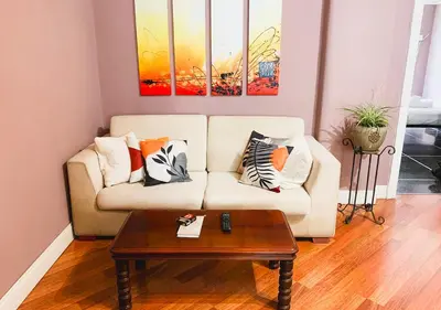 a living room with a couch and a coffee table at Luminoso a due passi da Piazza Bologna in Rome