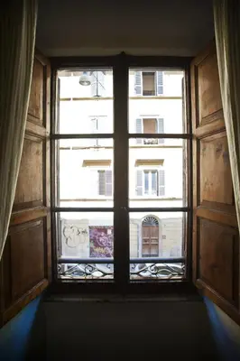 an open window with a view of a building at Trastevere Dream House in Rome