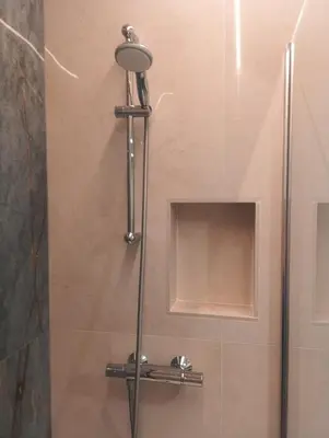 a shower in a bathroom with a glass door at QUIRINALE 56 suite in Rome