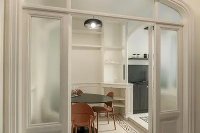 a dining room with a table and chairs at Trastevere 40 in Rome
