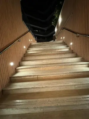 a set of stairs with lights on them at Alba White in Rome