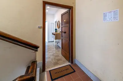 a hallway with a door leading into a room at DOMVS Quattro Venti in Rome
