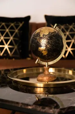 a globe sitting on top of a table at Ginny in Trastevere in Rome