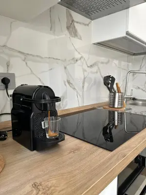a coffee maker on a counter in a kitchen at Domus Olympia in Rome