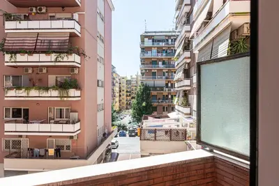 a view from a window of an apartment building at Rea house Colli Albani - B&Brother's rome in Rome