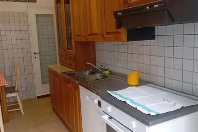 a kitchen with a sink and a counter top at da Giò a Trastevere in Rome