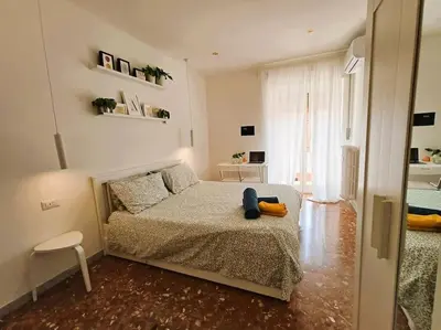 a small bedroom with a bed and a window at Pi gneto GH Locazione Turistica in Rome