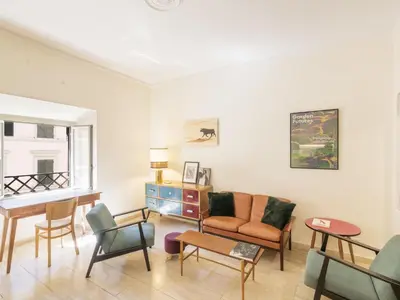 a living room with a couch and chairs at Apartment Alessandria Home by Interhome in Rome