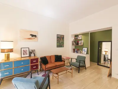 a living room with a couch and chairs at Apartment Alessandria Home by Interhome in Rome