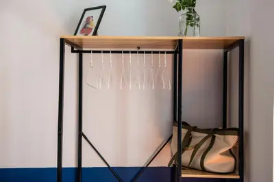 a closet with a shelf with shoes on it at La Trasteverina apartment in Rome