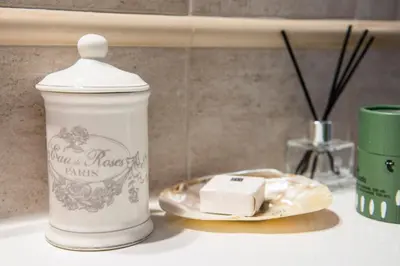 a white bottle of milk sitting on a kitchen counter at La Trasteverina apartment in Rome