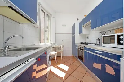 a kitchen with a sink and a microwave at Flaminio in Rome