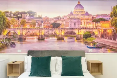 a bedroom with a painting of a bridge over a river at Susy's Guest House Room San Pietro in Rome