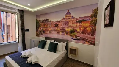 a bedroom with a large painting on the wall at Susy's Guest House Room San Pietro in Rome