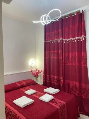 a bathroom with a shower and a toilet and a sink at Mille Guest house 2 in Rome