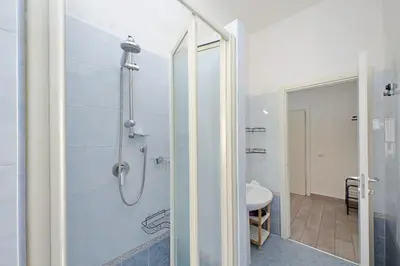 a bathroom with a shower and a sink at 4BNB - Cavalleggeri Apartment in Rome