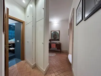 a hallway of a home with a hallway at Elegant 3 bedrooms apartment Colosseum - San Giovanni in Rome