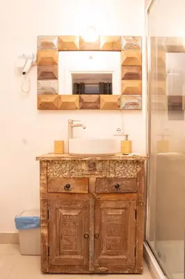 a bathroom with a sink and a mirror at Arco del Calidarium - Pantheon in Rome