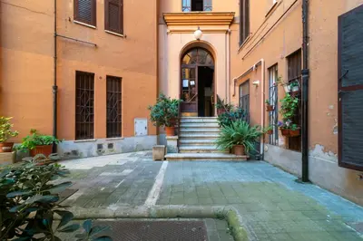 an entrance to a building with stairs and a door at Casa Barbieri boutique apartment Flaminio in Rome