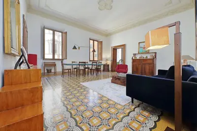 a living room with a couch and a table at Monti in Rome