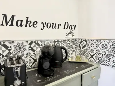 a sign that says make your day on a kitchen counter at Casa Fernanda in Rome