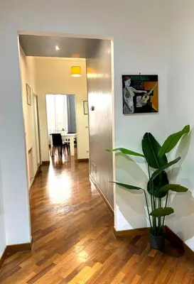 a hallway with a plant in the middle of a room at Apartment Cerri 2 in Rome