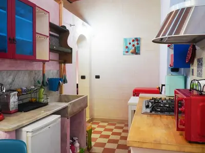 a kitchen with a sink and a stove at Giancarla Luxury Apartment Rome San Lorenzo - Termini in Rome