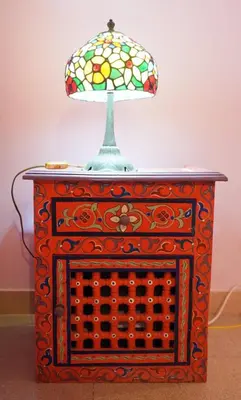 a table with a lamp on top of it at Giancarla Luxury Apartment Rome San Lorenzo - Termini in Rome