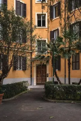 a building with a street light in front of it at New apartment near Piazza del Popolo in Rome
