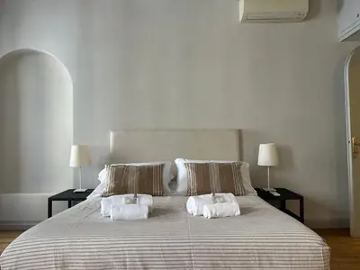 a bedroom with a bed with two towels on it at My Spanish Steps Apartment - 2 bathrooms in Rome
