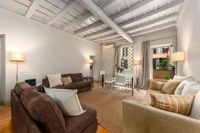 a living room with couches and a dining room at My Spanish Steps Apartment - 2 bathrooms in Rome