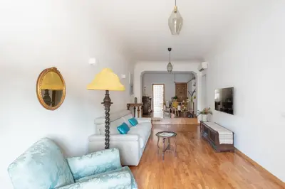 a living room with a couch and a table at iFlat Pantheon Peaceful & Comfortable Apartment in Rome