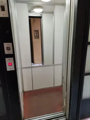 a hallway with a mirror in a room at Colosseo Vintage Apartment in Rome