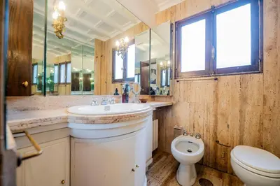 a bathroom with a sink and a toilet at Pantheon Terrace 2 BR Apartment in Rome
