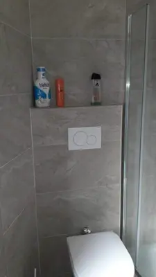 a bathroom with a shower stall with a toilet at ISABEL Apartment in Rome