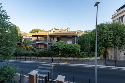 a house on the side of a street at CupolHome - Meraviglia A San Pietro in Rome