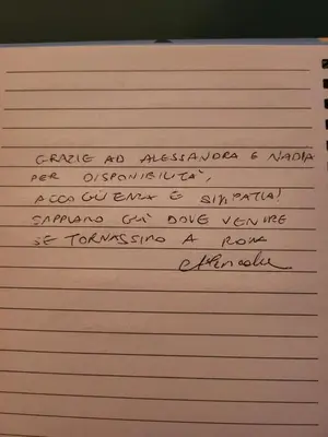a piece of paper with handwriting on it at Domus Mariposa in Rome