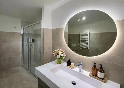 a bathroom with a sink and a toilet and a mirror at Ciao Collection in Rome