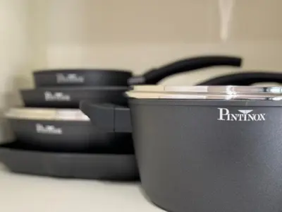 a pile of pots and pans sitting on a counter at Premium One-Bedroom Apartment plus sofa bed, Near Vatican - newly renovated in Rome