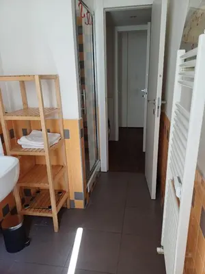 a bathroom with a shower and a toilet and a sink at Greta's house in Rome