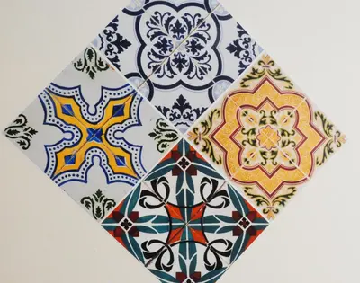 a group of different colored tiles on a wall at Suite Spagna 29 in Rome