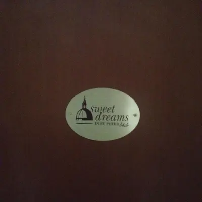 a sign with the words sweet dreams heritage on it at Sweet Dreams in St Peter B&b in Rome