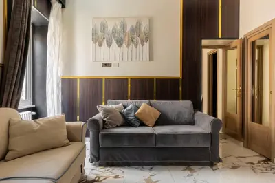 a living room with a couch at Angie's Dream Home - Spanish Steps Rome in Rome