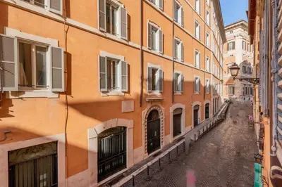 an empty street in a city with buildings at Pantheon Apartments - Piccola Roma in Rome