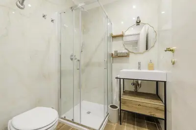 a bathroom with a shower and a toilet and a sink at Pantheon Apartments - Piccola Roma in Rome