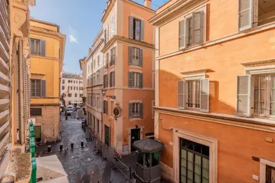 an alley between two buildings in a city at Pantheon Apartments - Piccola Roma in Rome