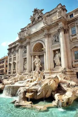 a building with a water fountain in front of it at A 10 min da San Giovanni Casa Indipendente in Rome