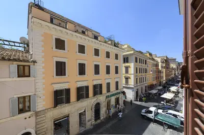 a view of a city street with buildings and cars at Bernini al Borgo in Rome