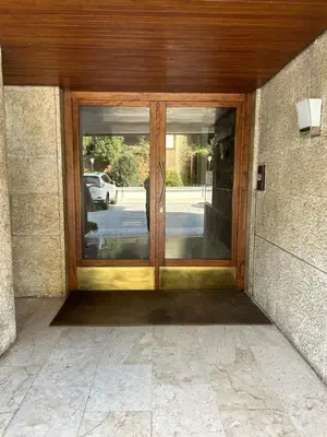 a front door of a house with glass doors at Rifugio Belsito in Rome